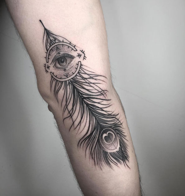 Peacock feather tattoo by Nathan Kostechko