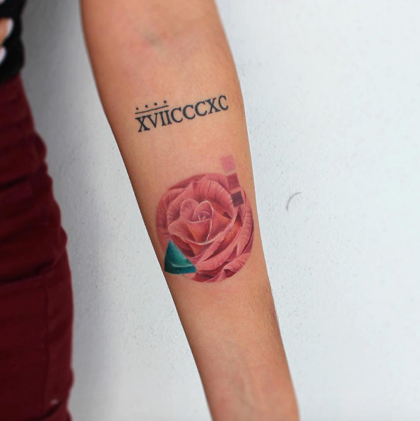 Super cool rose tattoo on forearm by Bryan Gutierrez