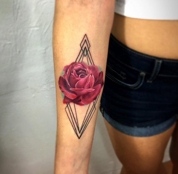 Rose tattoo on forearm by Bryan Gutierrez