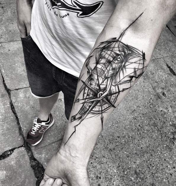 Sketched compass and elephant tattoo by Inez Janiak
