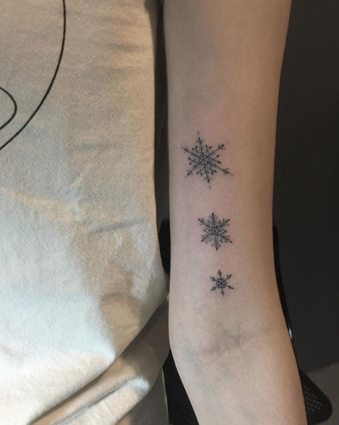 Small snowflake tattoos by Blackcanvas