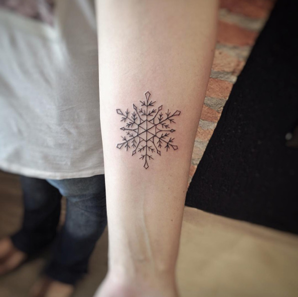 Snowflake on forearm by Lucas Martinelli
