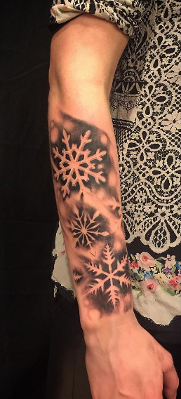 Snowflake half sleeve tattoo by Mark