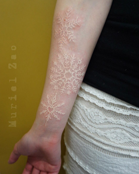 Subtle white ink snowflakes by Muriel Zao