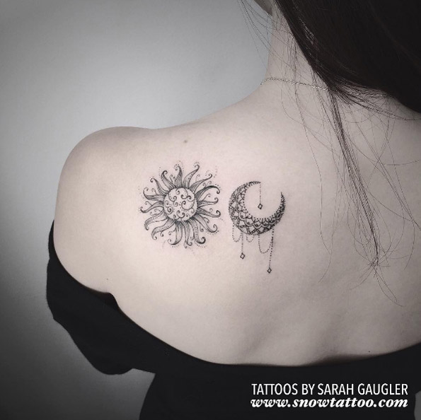 Artsy sun and moons tattoos on back shoulder by Sarah Gaugler