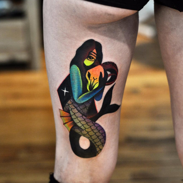 Colorful surrealist mermaid tattoo by David Cote