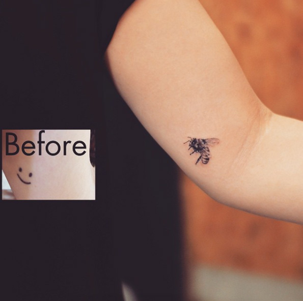 Small bee coverup tattoo by Tattooist Grain