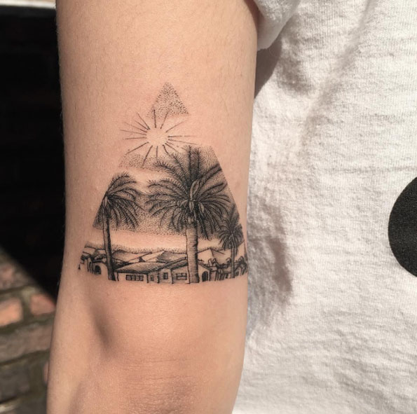 Triangular beach scene tattoo by Oozy