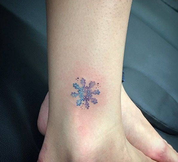 Watercolor ankle tattoo by Bonnie