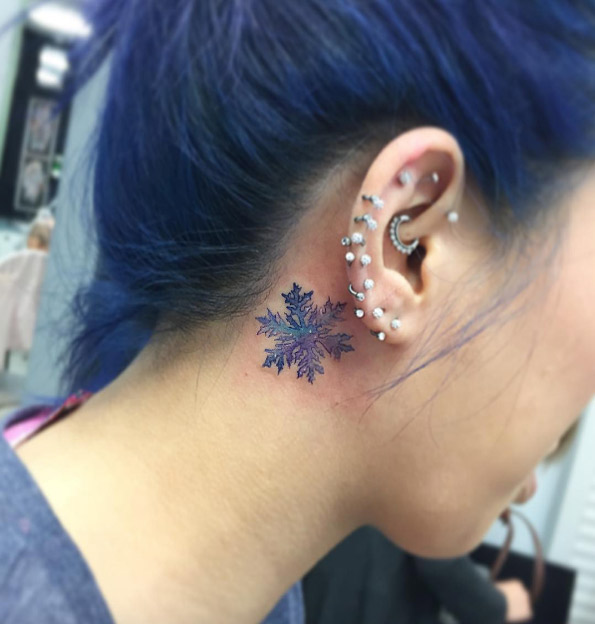 Snowflake behind-the-ear tattoo by Boomy