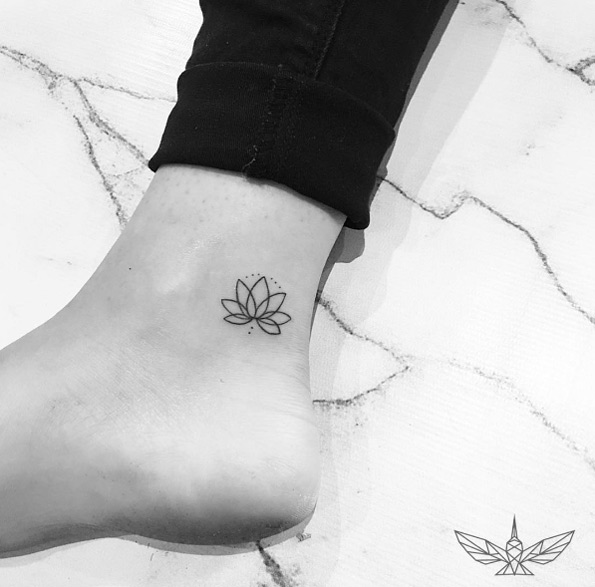 Lotus flower tattoo by Cholo