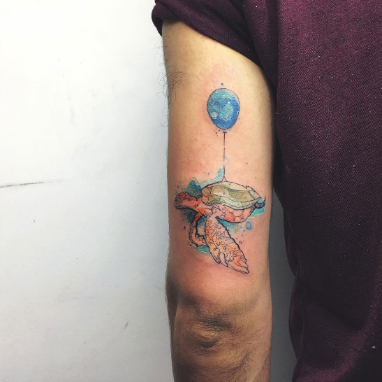 Watercolor turtle tattoo by Baris Yesilbas