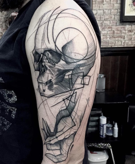 Skull tattoo by Frank Carrilho