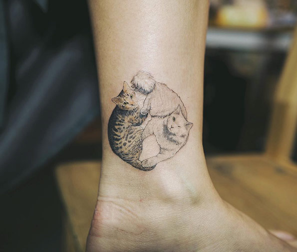 Two cats tattoo by Sol Art