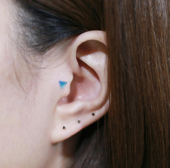 Triangle ear tattoo by Doy