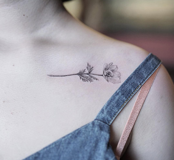 Flower on collarbone by Nando