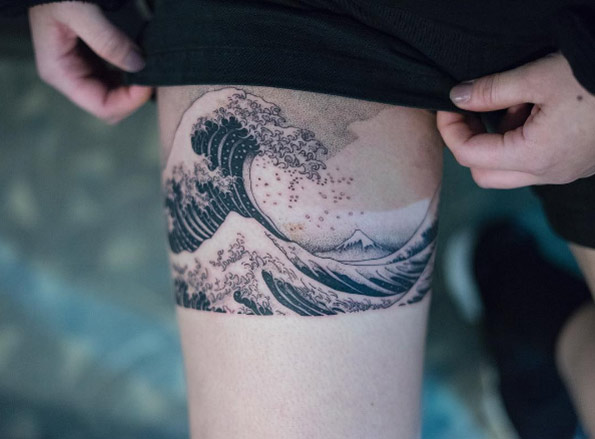 Hokusai wave tattoo on thigh by Oozy