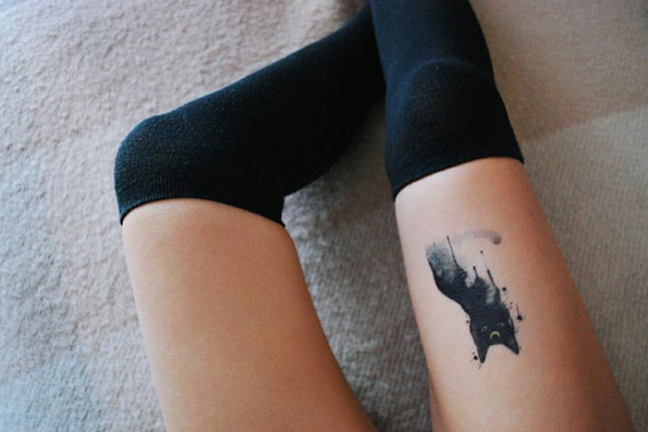 Black cat tattoo by Deborah Genchi