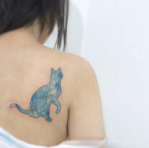 Blue floral cat tattoo by Wonseok