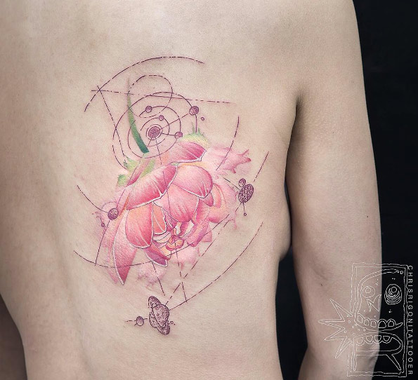 Cosmic flower tattoo by Chris Rigoni