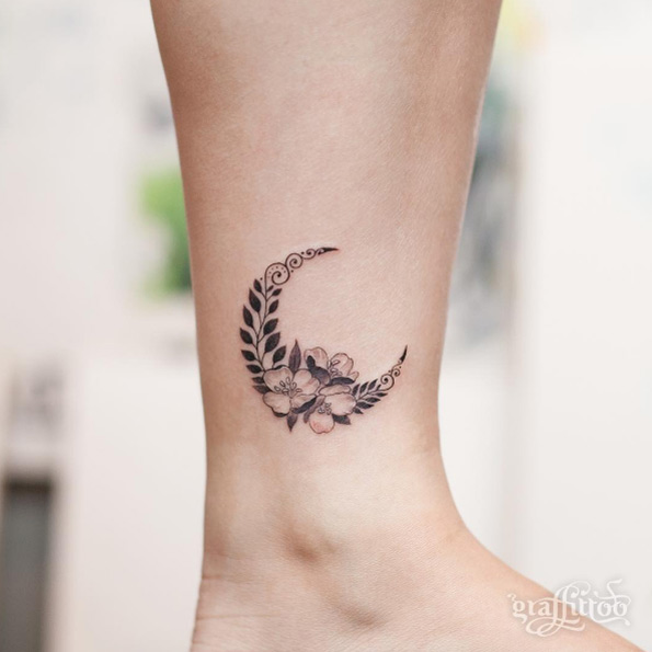 Crescent moon tattoo by River