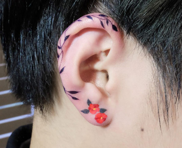 Floral ear tattoo by Zihee