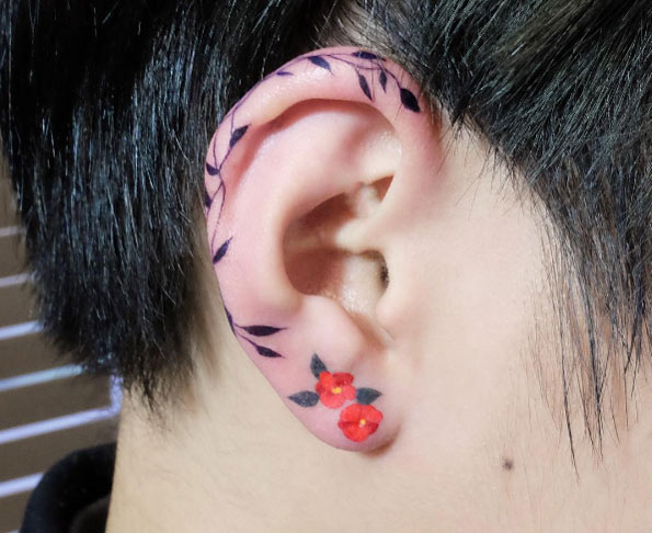 Ear tattoo by Zihee