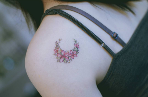 Floral crescent moon tattoo by Seoeon