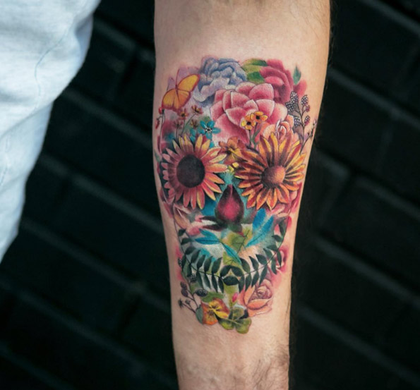 Floral skull tattoo by Joice Wang