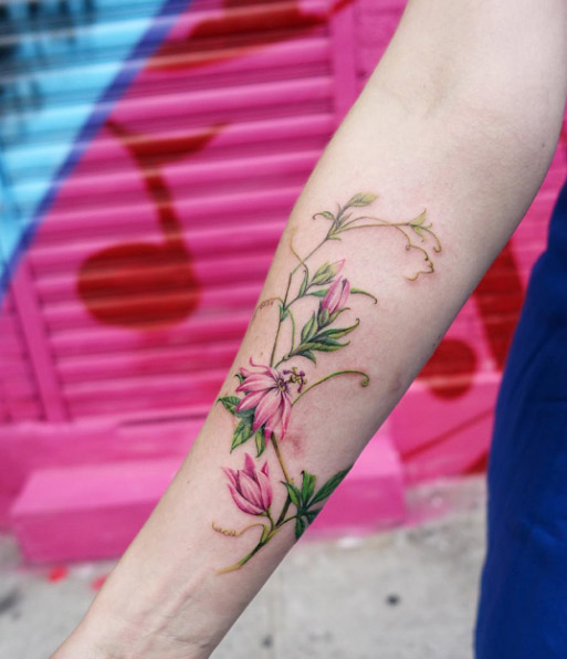 Florals on forearm by Nando