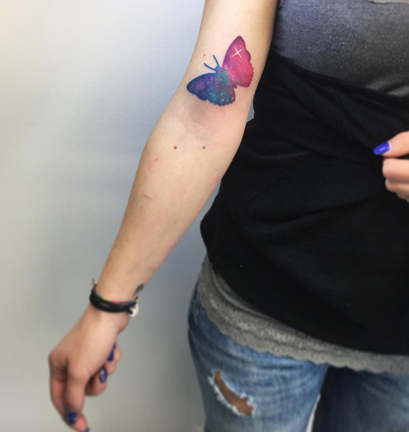 Galaxy butterfly tattoo by Sonia Tessari