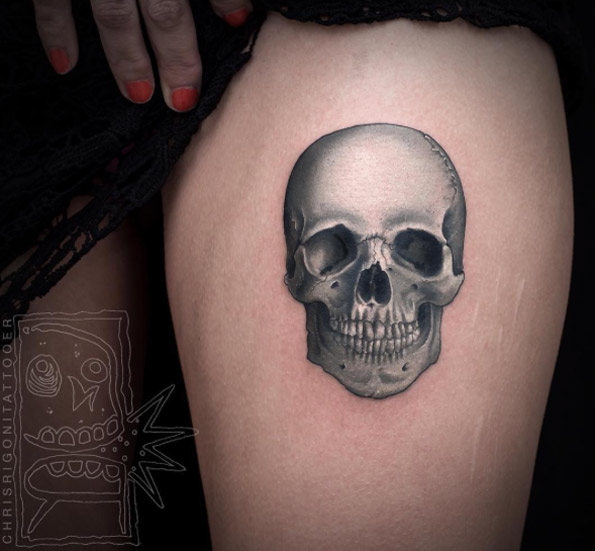 Opaque grey skull tattoo by Chris Rigoni