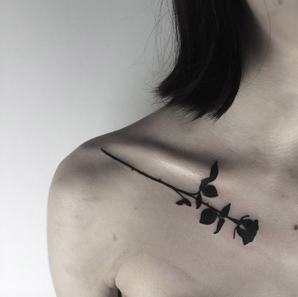 Heavy blackwork rose tattoo by Johnny Gloom