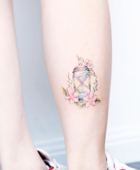 Hourglass tattoo by Mini Lau