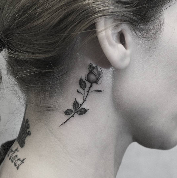 Black and grey ink behind the ear rose by Kane Navasard