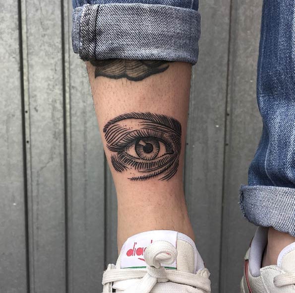 Linework eye tattoo by Bombayfoor