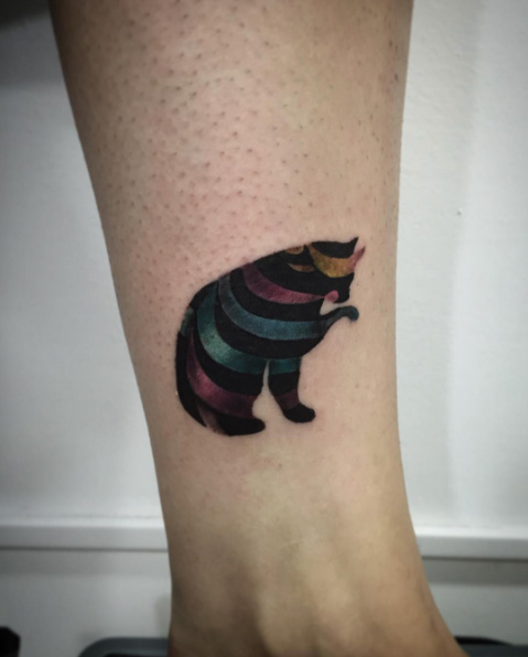 Optical kitten tattoo by Sara Morales