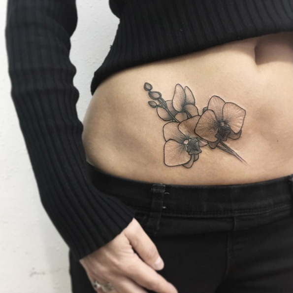 Blackwork orchid tattoo by Vlada Shevchenko