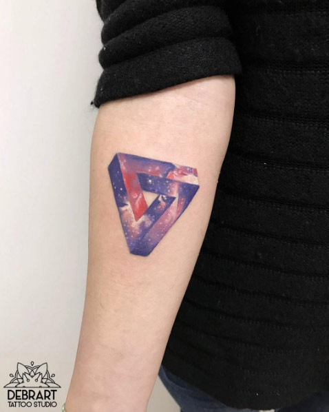 Penrose galactic triangle tattoo by Deborah Genchi