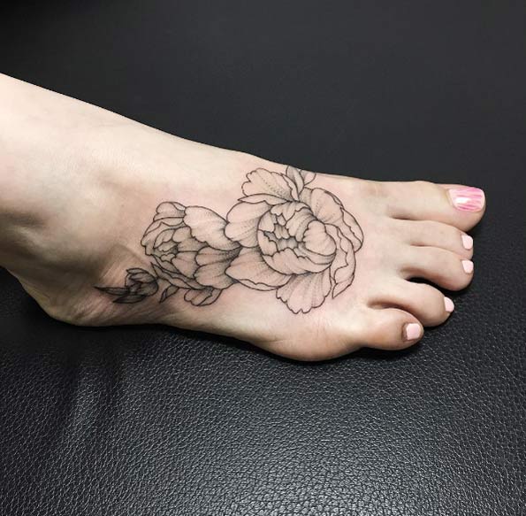 Peony tattoos on foot by Ira Shmarinova
