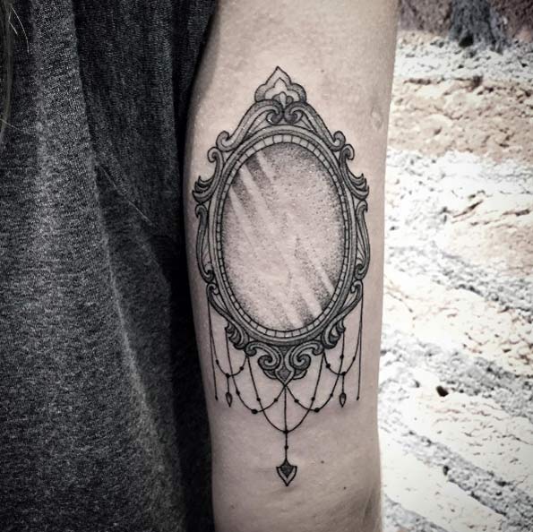 Vintage mirror tattoo by Lucas Martinelli