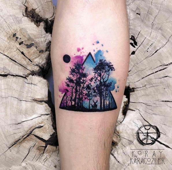 Watercolor forest tattoo by Koray Karagozler 