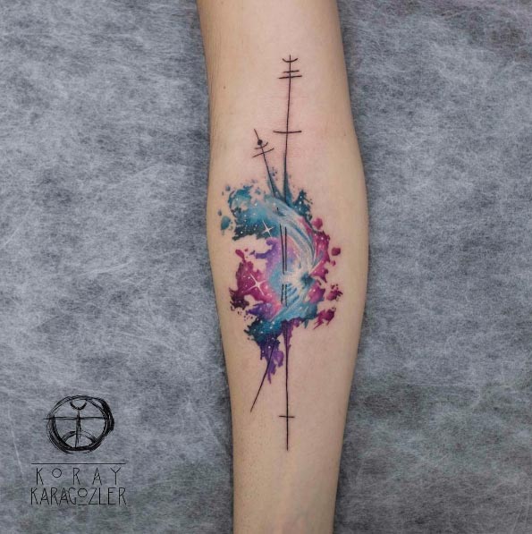 Watercolor nebula tattoo by Koray Karagozler