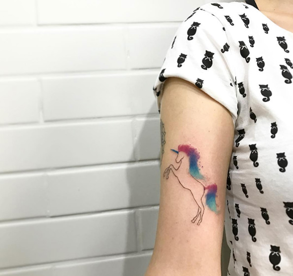 Watercolor unicorn tattoo by Junior Lopes
