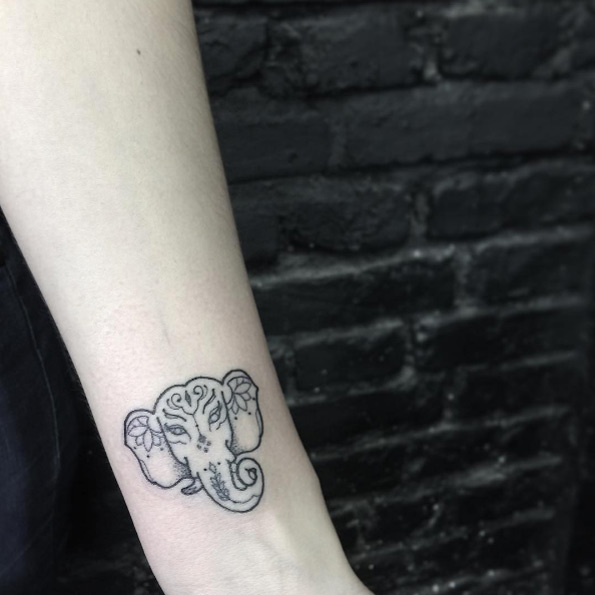 Elephant tattoo on wrist by Allan