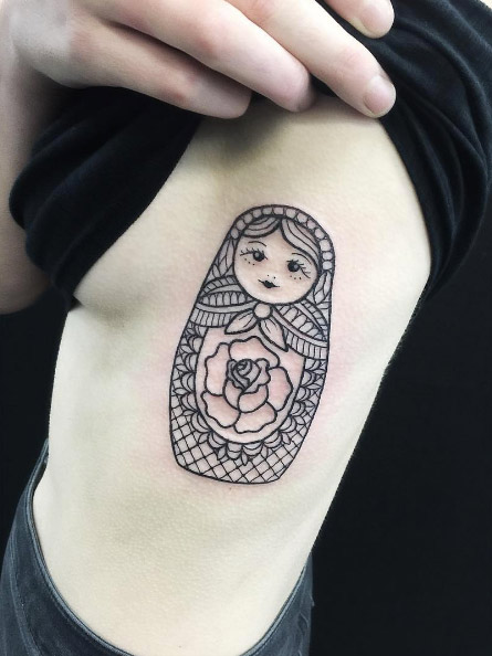 Minimalistic Russian nesting doll tattoo by Tommy Rattle