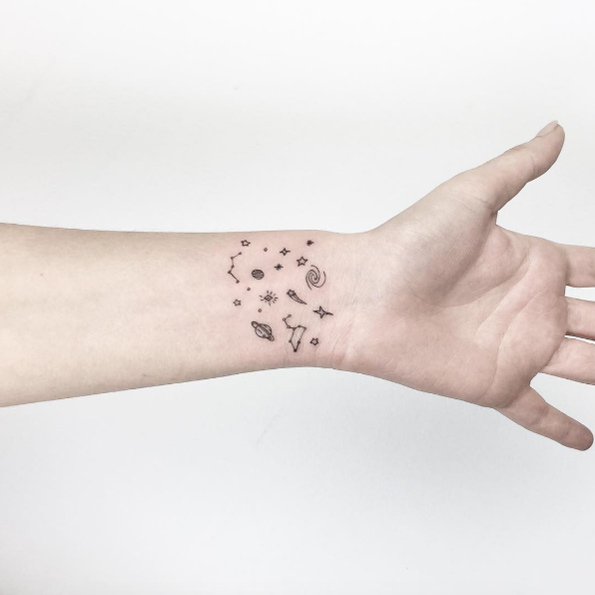 Galaxy wrist tattoo by Cagri Durmaz