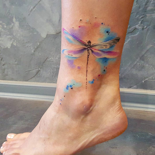 Watercolor dragonfly tattoo on ankle by Simona Blanar
