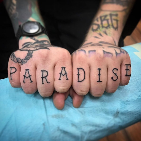 Paradise knuckle tattoos by Amy T.