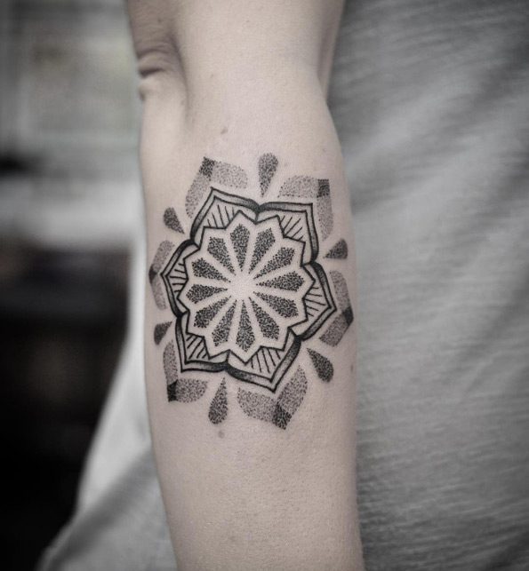 Dotwork geometric mandala tattoo by Chris Jones